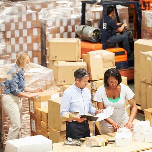 Warehouse workers preparing goods